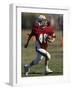 8 Year Old Boy Running with the Football-null-Framed Photographic Print