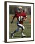 8 Year Old Boy Running with the Football-null-Framed Photographic Print