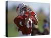 8 Year Old Boy Taking a Drink During a Football Game-null-Stretched Canvas