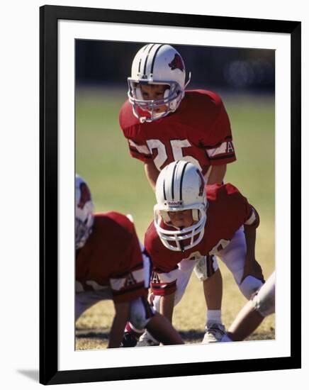 8 Year Old Boys Playing Football-null-Framed Photographic Print