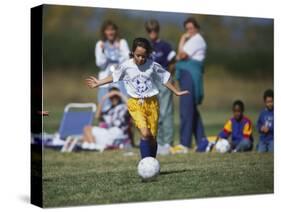 8 Year Old Girl in Action Durring Soccer Game, Lakewood, Colorado, USA-null-Stretched Canvas