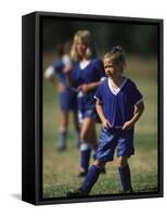 8 Year Old Girl in Action Durring Soccer Game, Lakewood, Colorado, USA-null-Framed Stretched Canvas