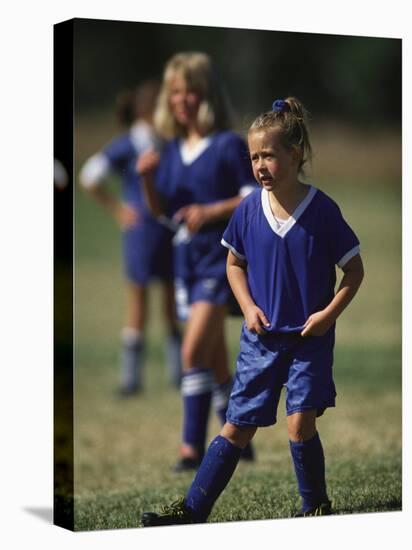 8 Year Old Girl in Action Durring Soccer Game, Lakewood, Colorado, USA-null-Stretched Canvas