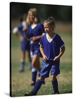 8 Year Old Girl in Action Durring Soccer Game, Lakewood, Colorado, USA-null-Stretched Canvas