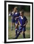 8 Year Old Girl in Action Durring Soccer Game, Lakewood, Colorado, USA-null-Framed Premium Photographic Print