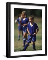 8 Year Old Girl in Action Durring Soccer Game, Lakewood, Colorado, USA-null-Framed Photographic Print