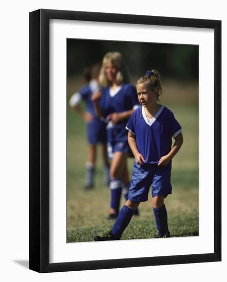 8 Year Old Girl in Action Durring Soccer Game, Lakewood, Colorado, USA-null-Framed Photographic Print