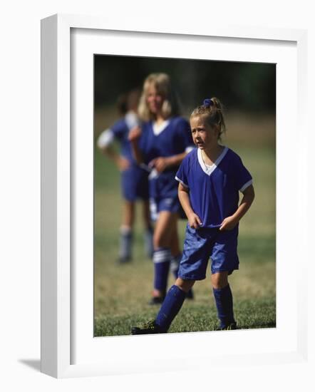 8 Year Old Girl in Action Durring Soccer Game, Lakewood, Colorado, USA-null-Framed Photographic Print