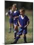 8 Year Old Girl in Action Durring Soccer Game, Lakewood, Colorado, USA-null-Mounted Photographic Print