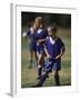 8 Year Old Girl in Action Durring Soccer Game, Lakewood, Colorado, USA-null-Framed Photographic Print