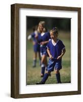 8 Year Old Girl in Action Durring Soccer Game, Lakewood, Colorado, USA-null-Framed Photographic Print