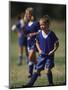 8 Year Old Girl in Action Durring Soccer Game, Lakewood, Colorado, USA-null-Mounted Photographic Print