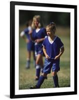 8 Year Old Girl in Action Durring Soccer Game, Lakewood, Colorado, USA-null-Framed Photographic Print