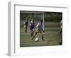 8 Year Old Girl in Action Durring Soccer Game, Lakewood, Colorado, USA-null-Framed Photographic Print