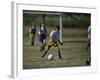 8 Year Old Girl in Action Durring Soccer Game, Lakewood, Colorado, USA-null-Framed Photographic Print