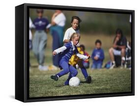 8 Year Old Girls in Action Durring Soccer Game, Lakewood, Colorado, USA-null-Framed Stretched Canvas