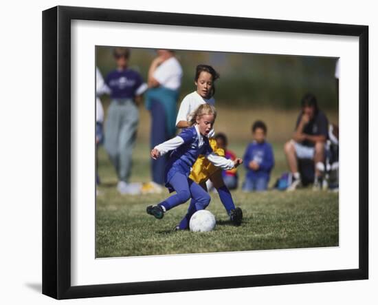 8 Year Old Girls in Action Durring Soccer Game, Lakewood, Colorado, USA-null-Framed Photographic Print