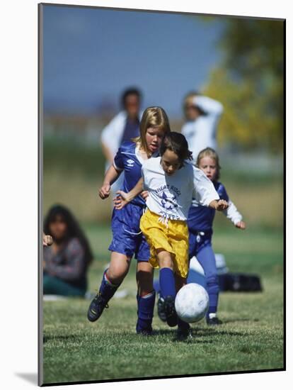 8 Year Old Girls in Action Durring Soccer Game, Lakewood, Colorado, USA-null-Mounted Photographic Print