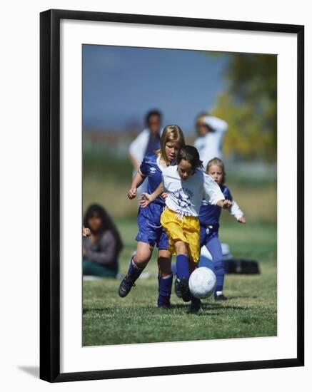 8 Year Old Girls in Action Durring Soccer Game, Lakewood, Colorado, USA-null-Framed Photographic Print