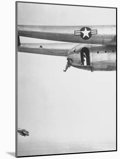 82nd Airborne Trooper Demonstrating Perfect Jump Form with Hands Clenched-Hank Walker-Mounted Photographic Print