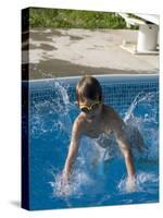 9 Year Old Boy Diving into a Swimming Pool, Woodstock, New York, USA-Paul Sutton-Stretched Canvas