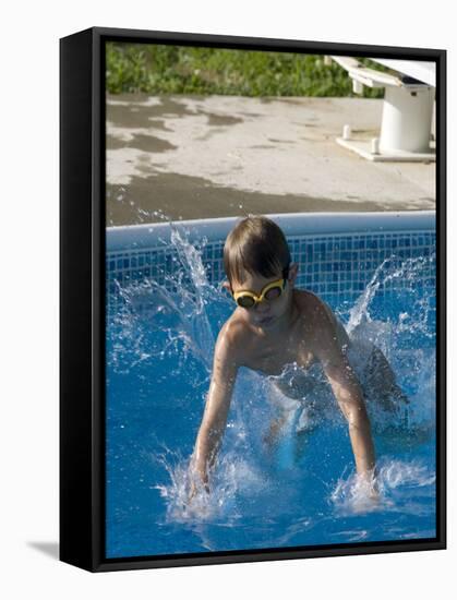 9 Year Old Boy Diving into a Swimming Pool, Woodstock, New York, USA-Paul Sutton-Framed Stretched Canvas