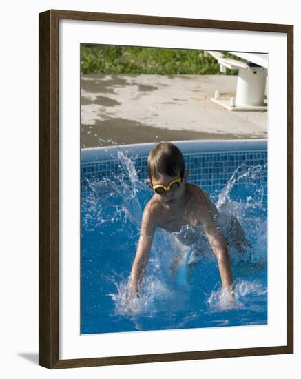 9 Year Old Boy Diving into a Swimming Pool, Woodstock, New York, USA-Paul Sutton-Framed Photographic Print