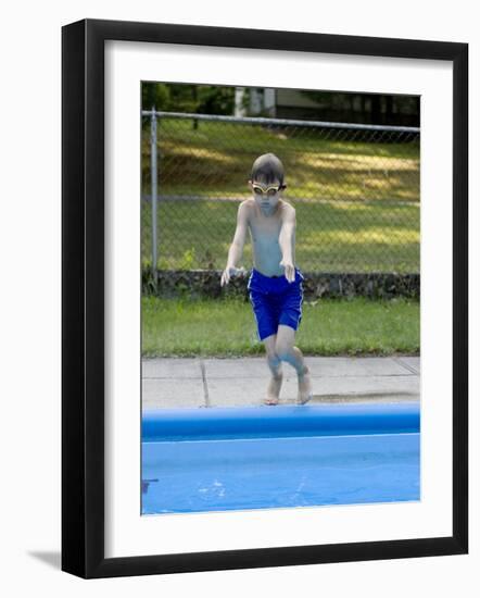 9 Year Old Boy Jumping into the Swimming Pool, Kiamesha Lake, New York, USA-Paul Sutton-Framed Photographic Print