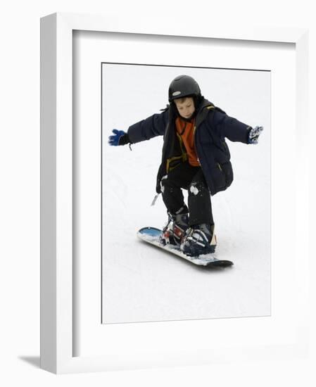 9 Year Old Boy Riding His Snowboard, New York, USA-Paul Sutton-Framed Photographic Print