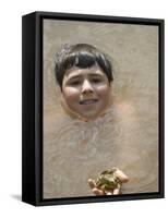 9 Year Old Boy Showing Off His Frog in a Pond, Woodstock, New York, USA-Paul Sutton-Framed Stretched Canvas