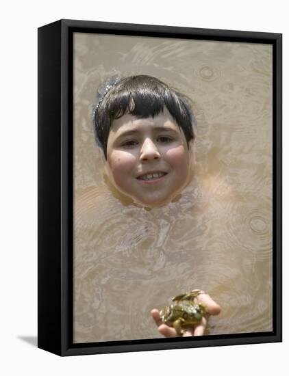 9 Year Old Boy Showing Off His Frog in a Pond, Woodstock, New York, USA-Paul Sutton-Framed Stretched Canvas