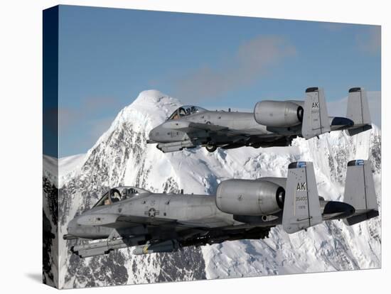 A-10 Thunderbolt II's Fly Over Mountainous Landscape-Stocktrek Images-Stretched Canvas