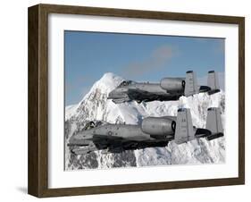 A-10 Thunderbolt II's Fly Over Mountainous Landscape-Stocktrek Images-Framed Photographic Print