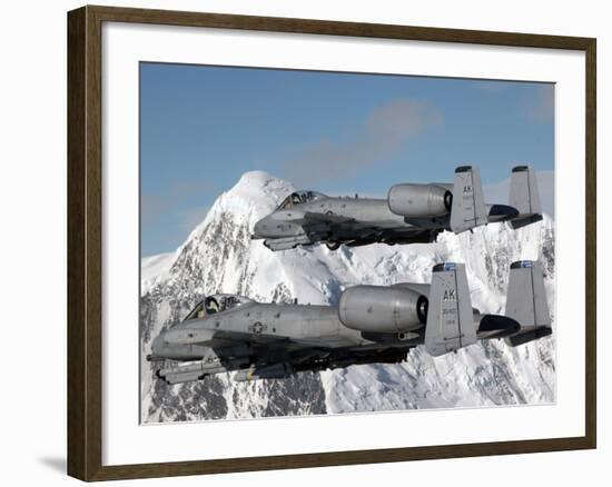 A-10 Thunderbolt II's Fly Over Mountainous Landscape-Stocktrek Images-Framed Photographic Print