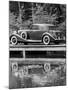 A 1933 Hispano-Suiza K6 Reflected in a Lake-null-Mounted Photographic Print