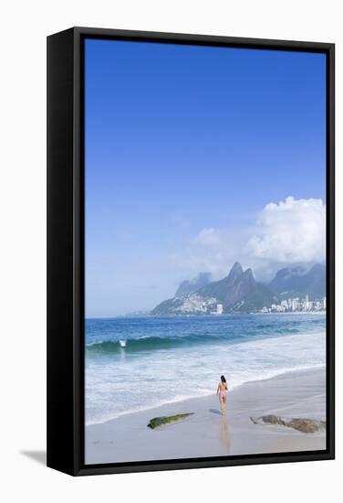 A 20-25 Year Old Young Brazilian Woman on Ipanema Beach with the Morro Dois Irmaos Hills-Alex Robinson-Framed Stretched Canvas