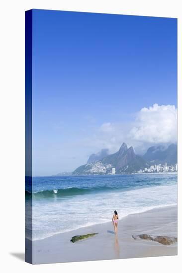 A 20-25 Year Old Young Brazilian Woman on Ipanema Beach with the Morro Dois Irmaos Hills-Alex Robinson-Stretched Canvas