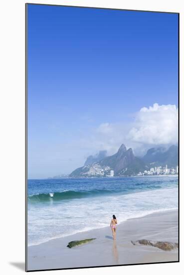 A 20-25 Year Old Young Brazilian Woman on Ipanema Beach with the Morro Dois Irmaos Hills-Alex Robinson-Mounted Photographic Print