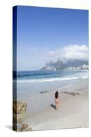 A 20-25 Year Old Young Brazilian Woman on Ipanema Beach with the Morro Dois Irmaos Hills-Alex Robinson-Stretched Canvas