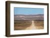 A 4X4 Car Leaves a Cloud of Dust as it Apporachs Along the Long Dusty Road to the Fish River Canyon-Alex Treadway-Framed Premium Photographic Print