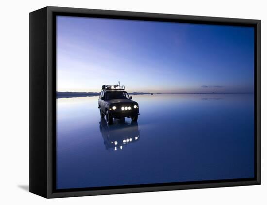 A 4X4 Rests in the Early Am Reflection in a Flooded Salt Flat In-Sergio Ballivian-Framed Stretched Canvas