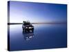 A 4X4 Rests in the Early Am Reflection in a Flooded Salt Flat In-Sergio Ballivian-Stretched Canvas