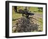 A .50 Caliber Browning Machine Gun with a Pile of Spent Cases and Links-Stocktrek Images-Framed Photographic Print