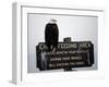 A Bald Eagle Sits on a Sign at the Eagle Feeding and Viewing Area-null-Framed Photographic Print