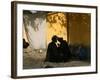 A Barber Cuts the Beard of a Client in His Barber Post in Kabul, Afghanistan, October 1, 2006-Rodrigo Abd-Framed Photographic Print