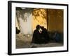 A Barber Cuts the Beard of a Client in His Barber Post in Kabul, Afghanistan, October 1, 2006-Rodrigo Abd-Framed Photographic Print