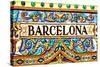 A Barcelona Sign Over A Mosaic Wall-nito-Stretched Canvas