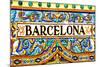 A Barcelona Sign Over A Mosaic Wall-nito-Mounted Art Print