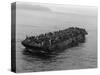 A Barge Packed with Vietnamese Refugees from Danang is Towed to the Ss Pioneer Contender-null-Stretched Canvas