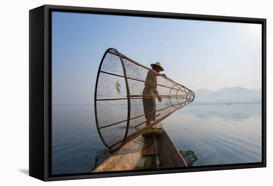 A Basket Fisherman on Inle Lake Prepares to Plunge His Cone Shaped Net, Shan State, Myanmar (Burma)-Alex Treadway-Framed Stretched Canvas